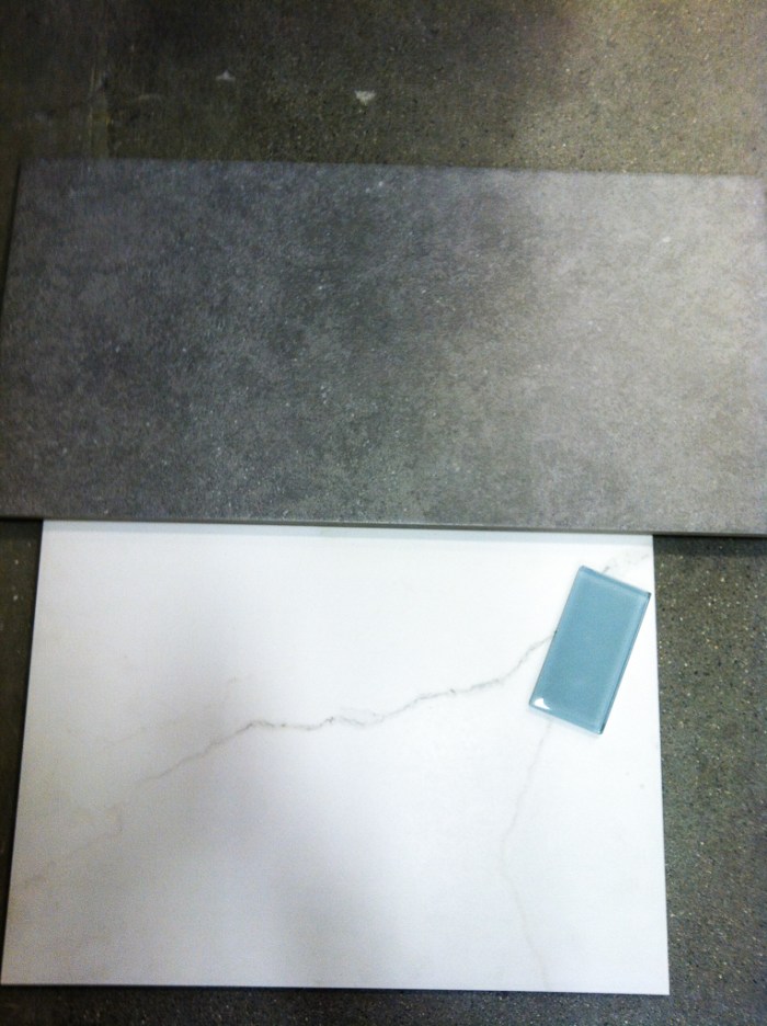 Lowe's tile.  Gray for the floor and the marble ceramic for the walls