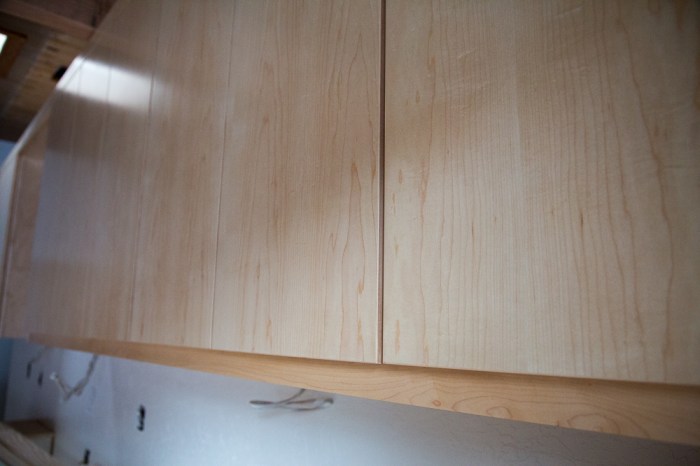 Close up of finish on cabinets (hardware not yet installed)