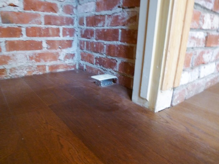 Raised plug in wine cabinet