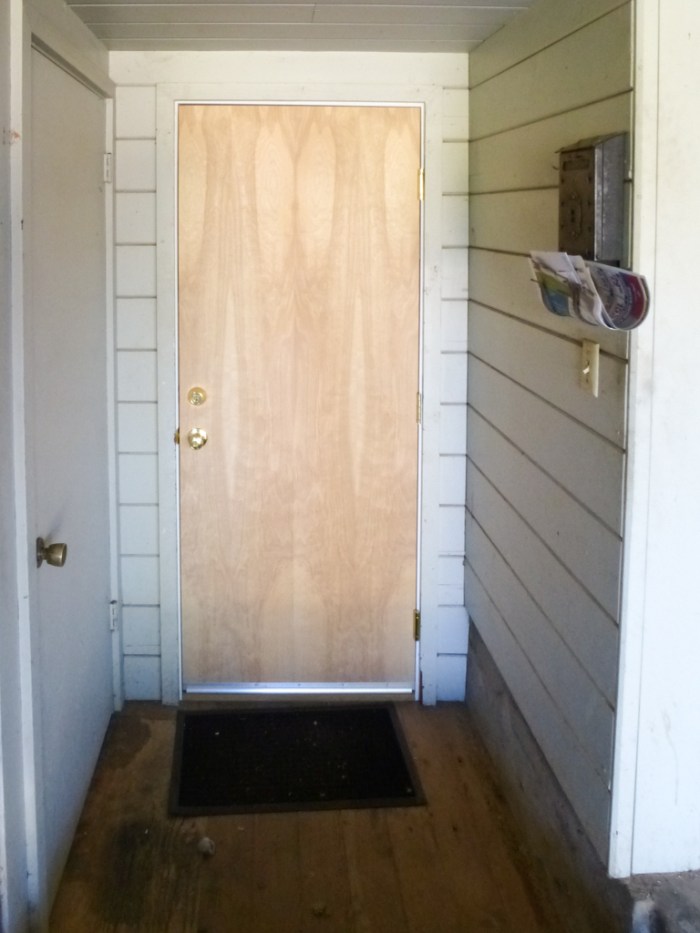 New solid core door in carport