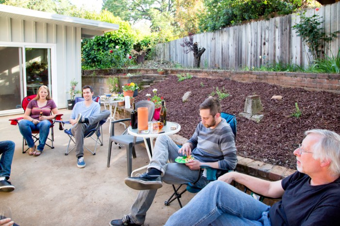 The family and friends enjoying the patio